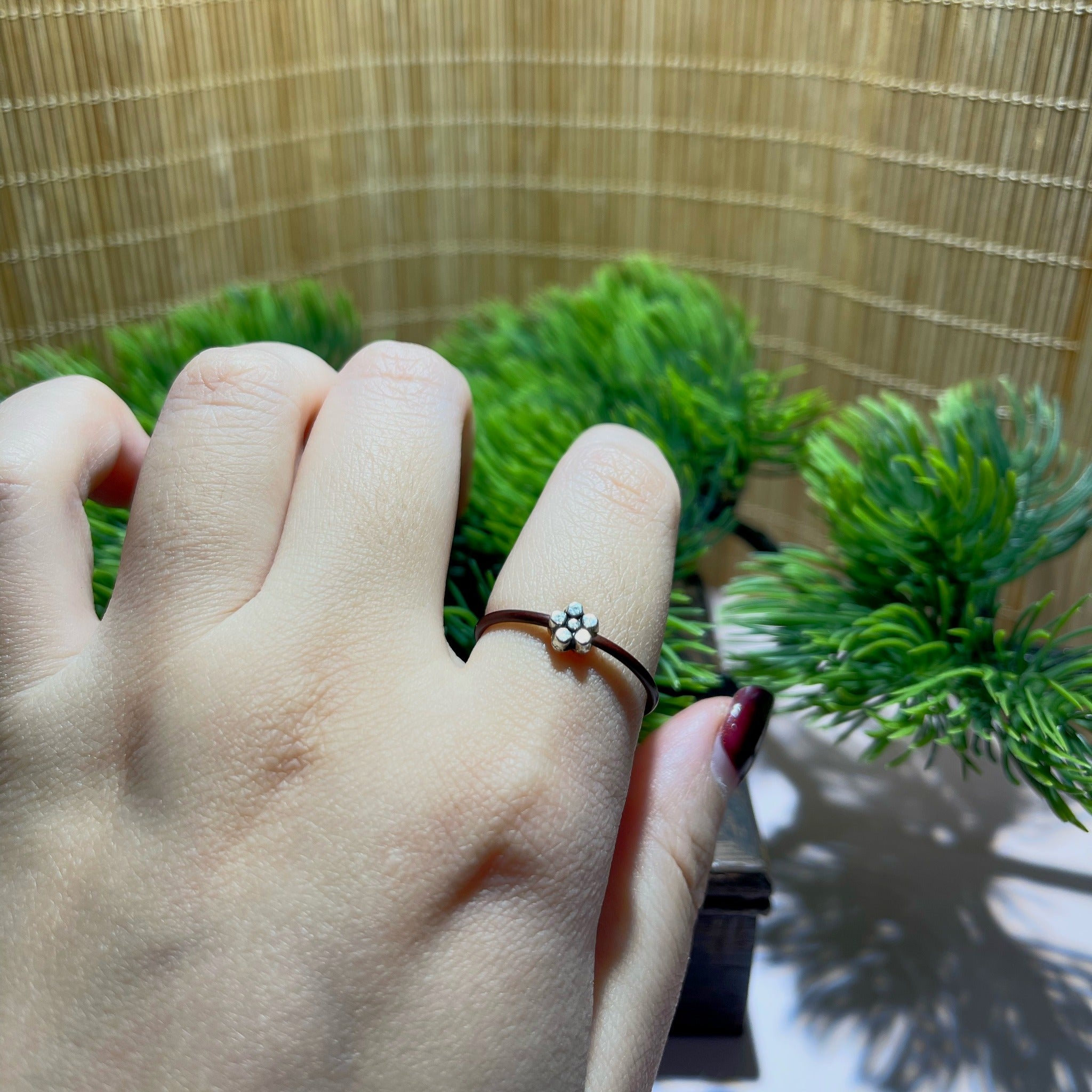 Silver Blossom Vine Ring worn on hand